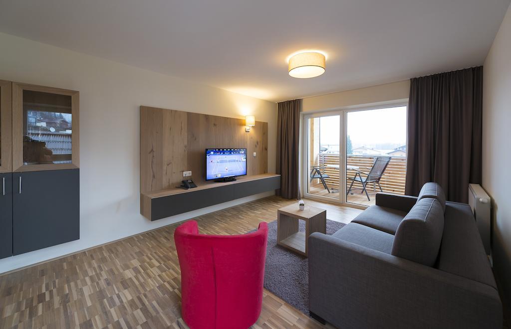 Appartementhotel Sonnenhof Kössen Oda fotoğraf