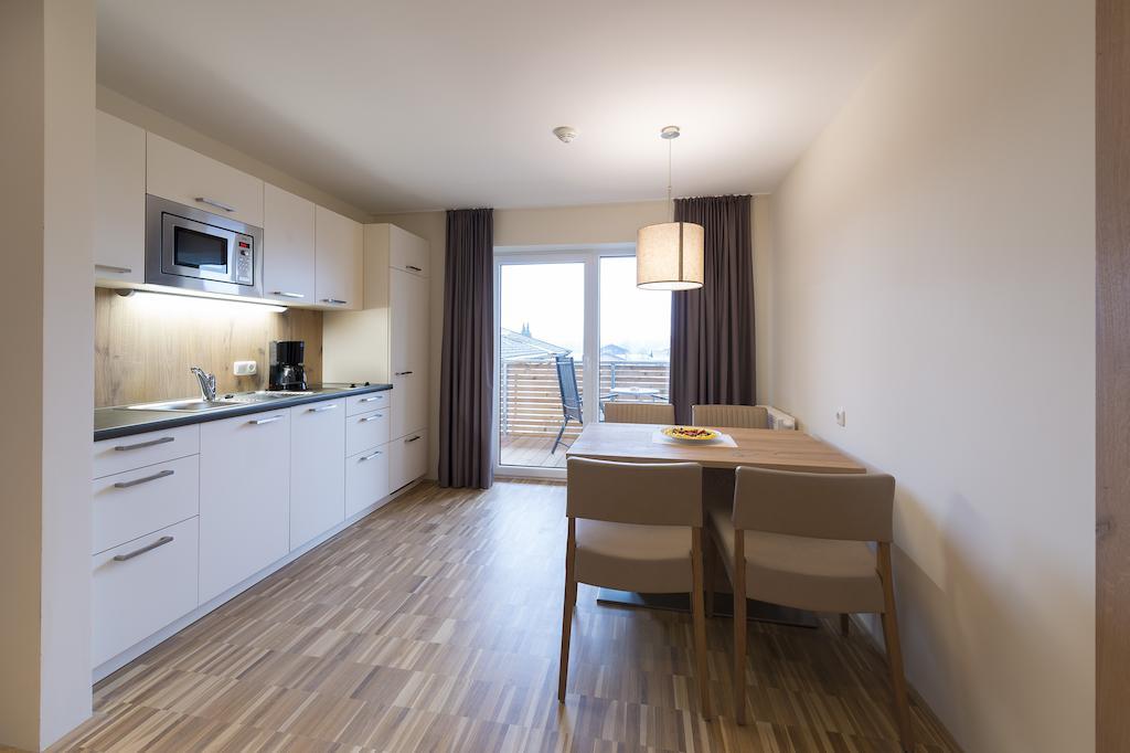 Appartementhotel Sonnenhof Kössen Oda fotoğraf