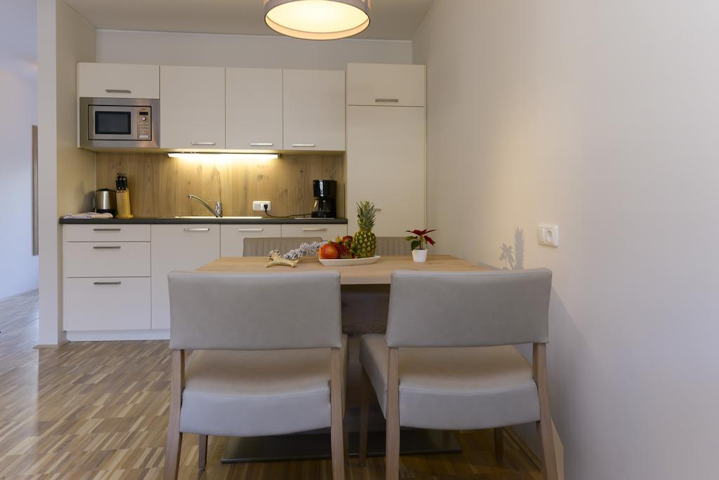 Appartementhotel Sonnenhof Kössen Oda fotoğraf