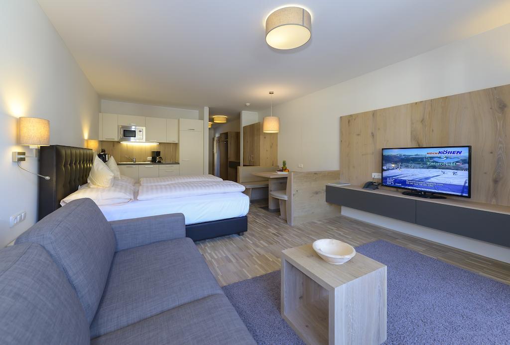 Appartementhotel Sonnenhof Kössen Oda fotoğraf